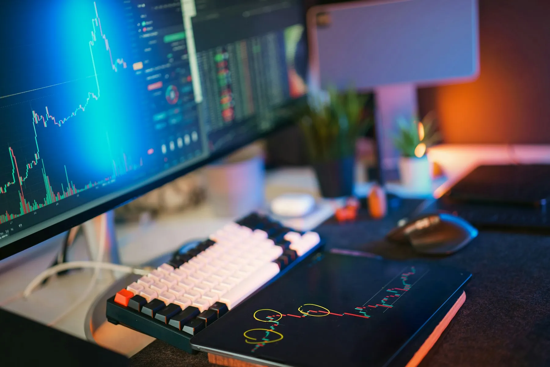 Stock market data glowing on a desktop monitor