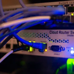 Close up of ethernet cables plugged into a cloud router switch